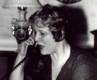Old fashioned photo of woman talking on phone